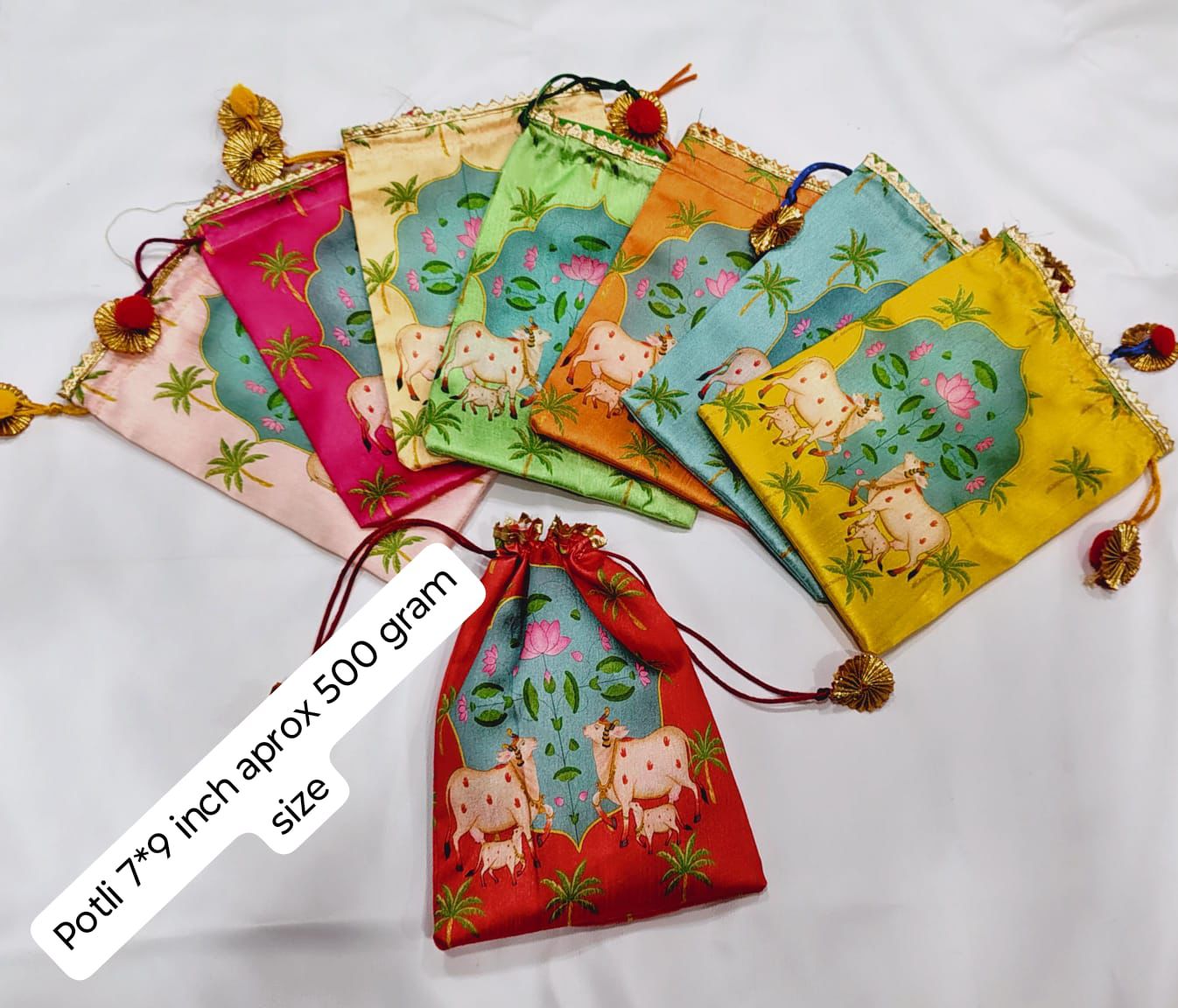 Multicolor Silk Pichwai Potli Gift Bags with Sacred Cow and Lotus Print in Pink Green Orange Yellow and Red – 7x9 inch Housewarming Return Gift Bag – MuruganDecors USA