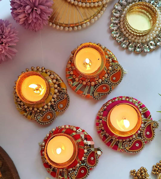 Festive decorated tealight holder for Diwali and Christmas home décor. Perfect as return gifts for parties, housewarmings and corporate events. Reusable and ready for standard t-light candles
