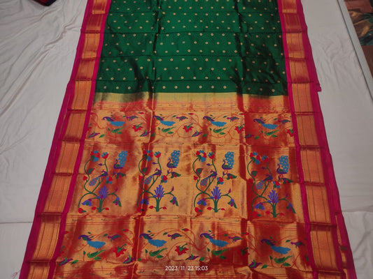 Buy Yeola Pure Maharani Paithani Silk Saree in Green with Butta design. Authentic zari work, pure silk. Perfect for weddings & festivals. Ships across USA.